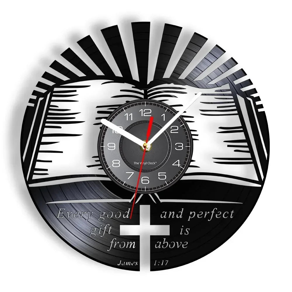 black wall clock featuring a silhouette of Jesus wearing a crown of thorns and a cross in the background made from recycled records